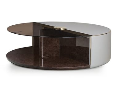 ECLIPSE - Round glass coffee table with integrated magazine rack by Turri