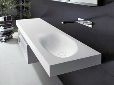 SHAPE H10 - Wall-mounted Cristalplant® washbasin with integrated countertop by Falper