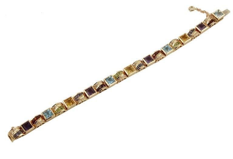 14 Kt Rose Gold Bracelet With Yellow and Blue Topazs, Peridots, Amethysts & Diamonds