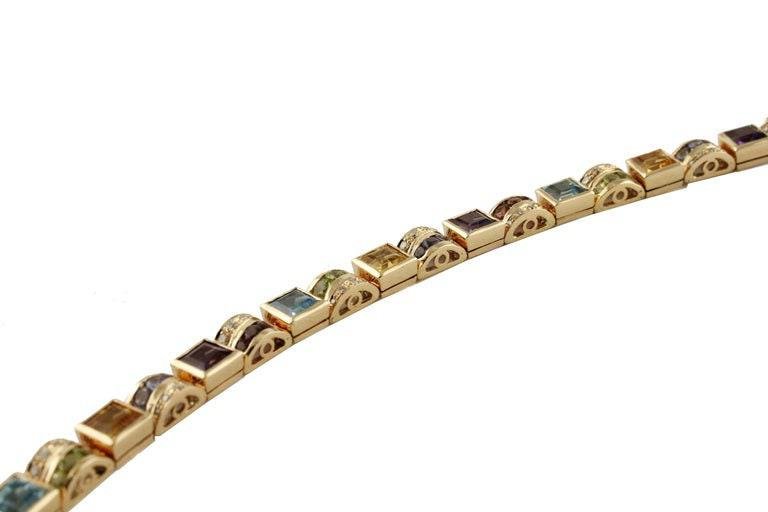 14 Kt Rose Gold Bracelet With Yellow and Blue Topazs, Peridots, Amethysts & Diamonds