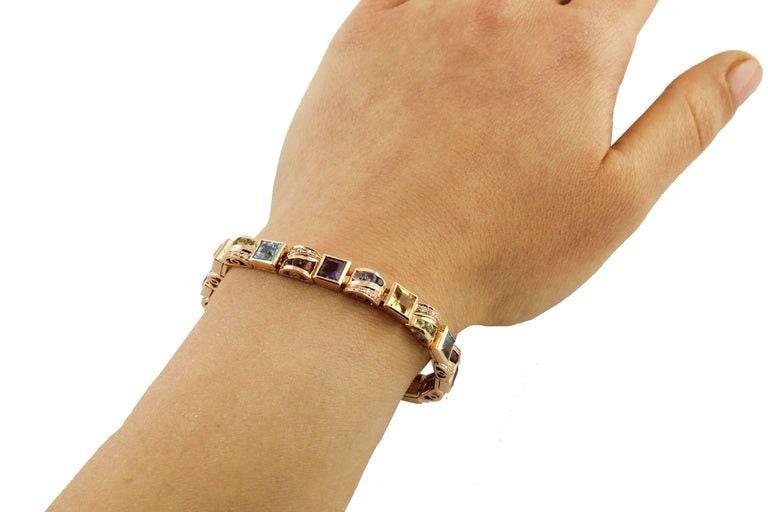 14 Kt Rose Gold Bracelet With Yellow and Blue Topazs, Peridots, Amethysts & Diamonds