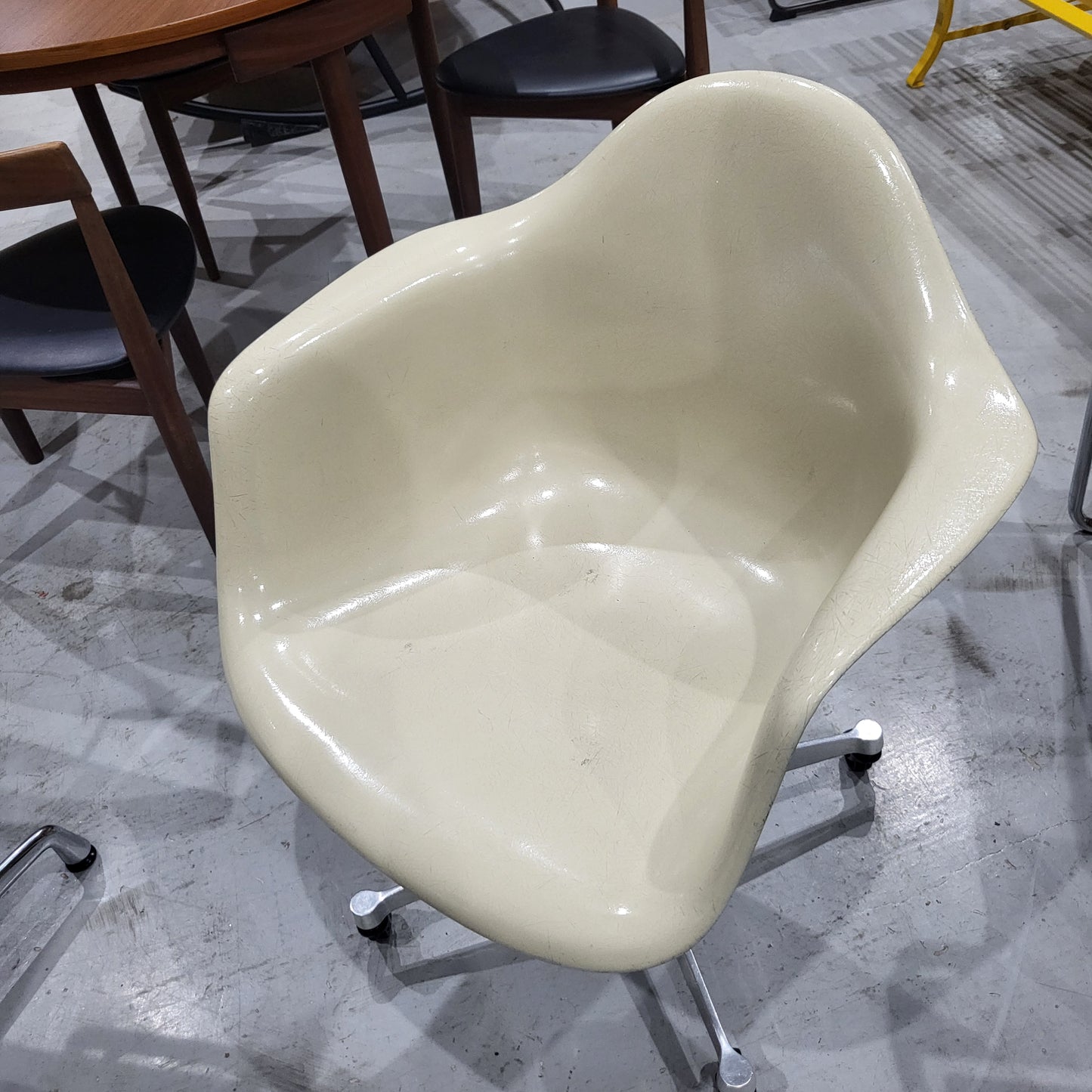 Eames Fiberglass Pacc Armchair with castors