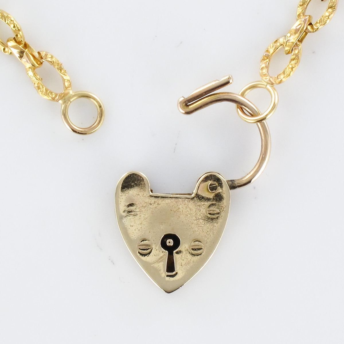 19th Century 18 Karat Yellow Gold Chiseled Chain and Heart-Shaped Padlock Necklace-OLU-896702