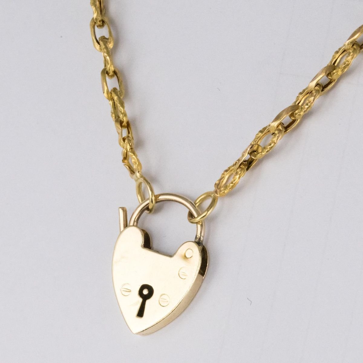 19th Century 18 Karat Yellow Gold Chiseled Chain and Heart-Shaped Padlock Necklace-OLU-896702