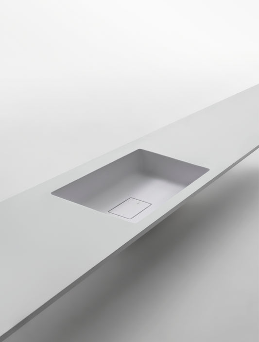 PURE - Washbasin with integrated countertop by Falper