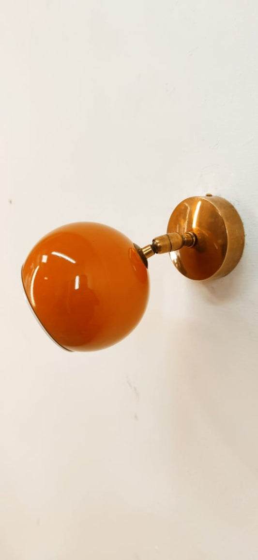 Adjustable Sconce with Orange Metal Dome