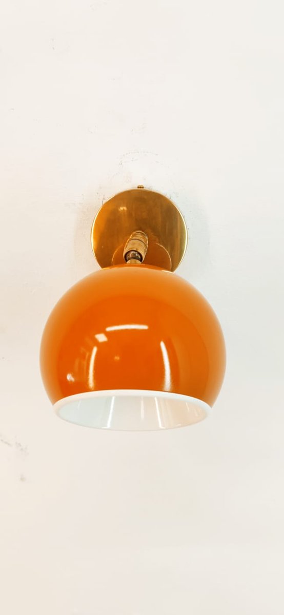 Adjustable Sconce with Orange Metal Dome