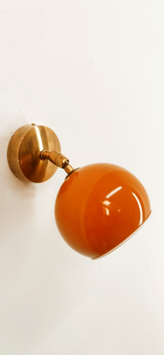 Adjustable Sconce with Orange Metal Dome