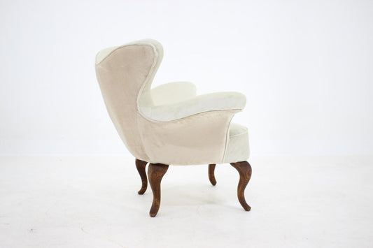 Antique Curved Armchair