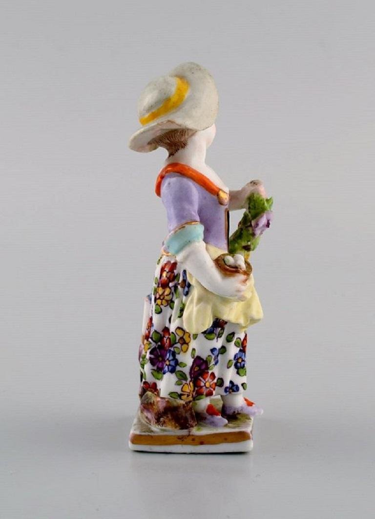 Antique Hand-Painted Porcelain Figure of Girl With Flowers from Augustus Rex, Germany