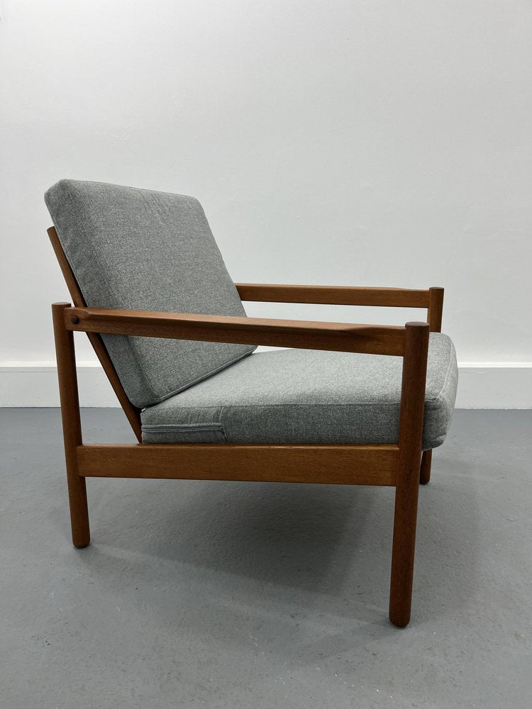 Armchair by Ib Kofod-Larsen for Magnus Olesen, 1956