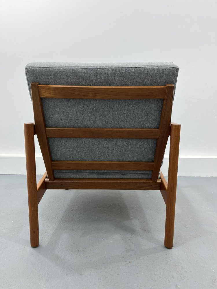 Armchair by Ib Kofod-Larsen for Magnus Olesen, 1956