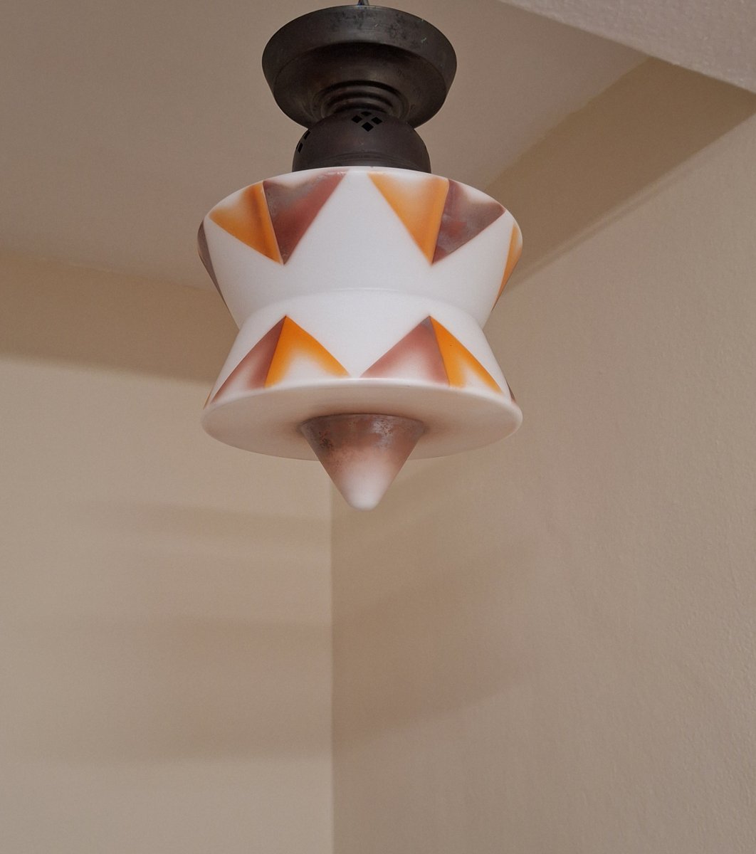 Art Deco German Ceiling Lamp with White Glass Shade with an Orange-Brown Spray Decorative Motif on an Original Brass Mount