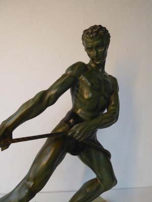 Art Deco Green Patinated Metal and Marble Sculpture of Man Pulling Stone from Ucra, France-AWL-1139129