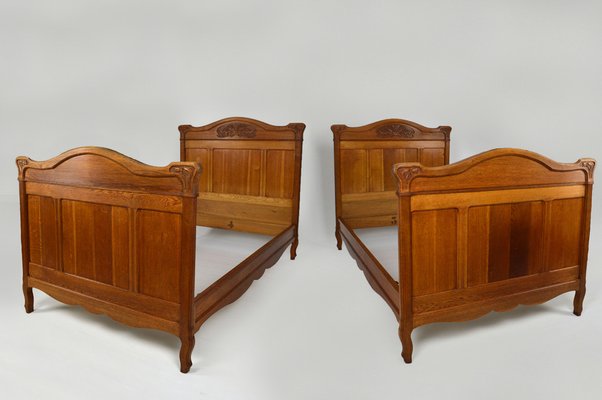 Art Nouveau Twin Beds in Carved Oak, France, 1910s, Set of 2-XNH-1719422