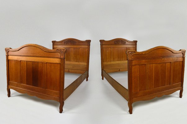 Art Nouveau Twin Beds in Carved Oak, France, 1910s, Set of 2-XNH-1719422