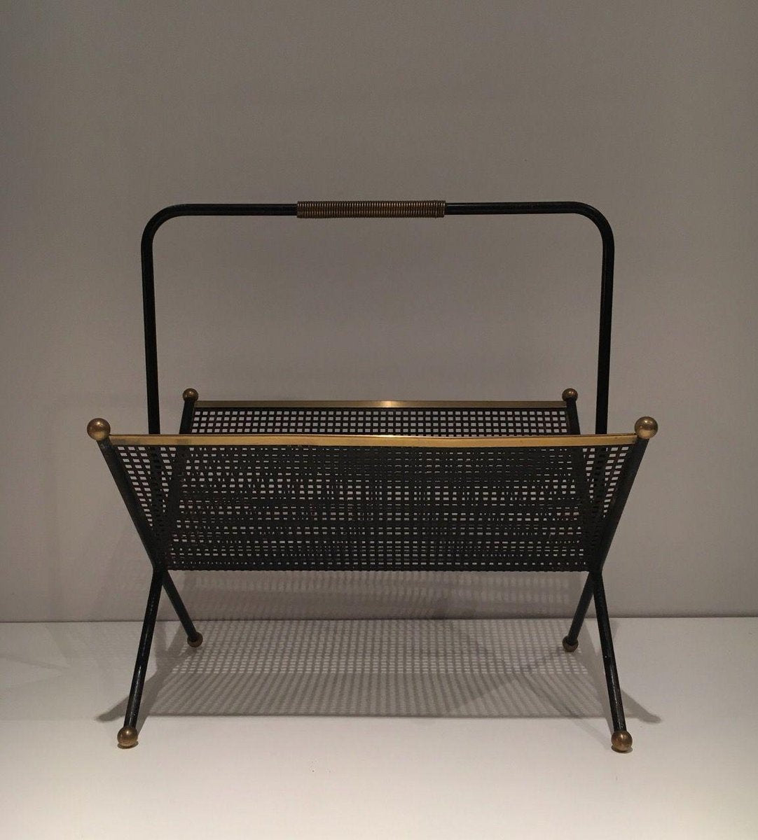 Black Lacquered Metal Magazine Rack