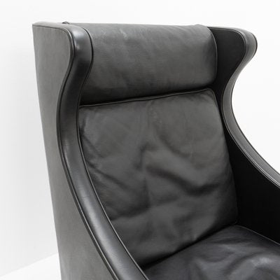 Black Leather Wingchair and Footstool by Borge Mogensen for Fredericia, 1960s, Set of 2-TJQ-1378679