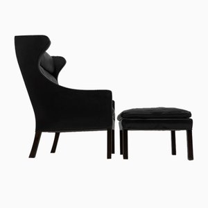 Black Leather Wingchair and Footstool by Borge Mogensen for Fredericia, 1960s, Set of 2-TJQ-1378679