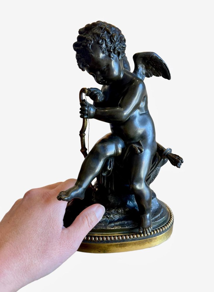 Bronze Cupid Tendant His Bow in the style of Charles Gabriel Sauvage