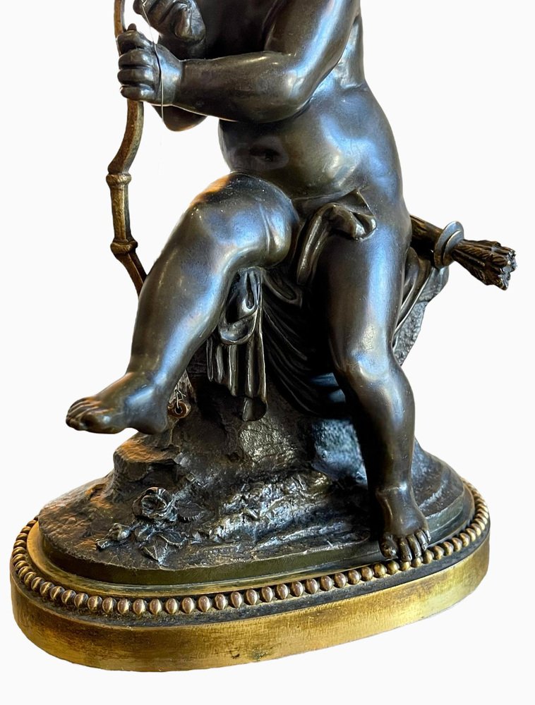 Bronze Cupid Tendant His Bow in the style of Charles Gabriel Sauvage