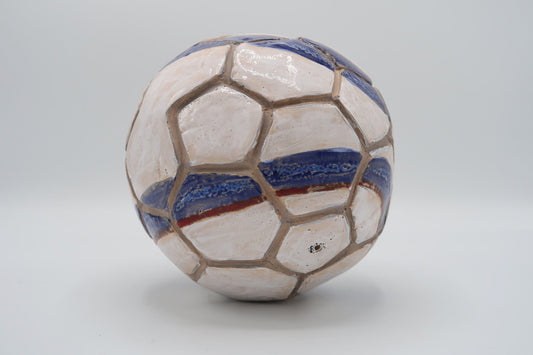 Ceramic Football by Caroline Pholien, 2019