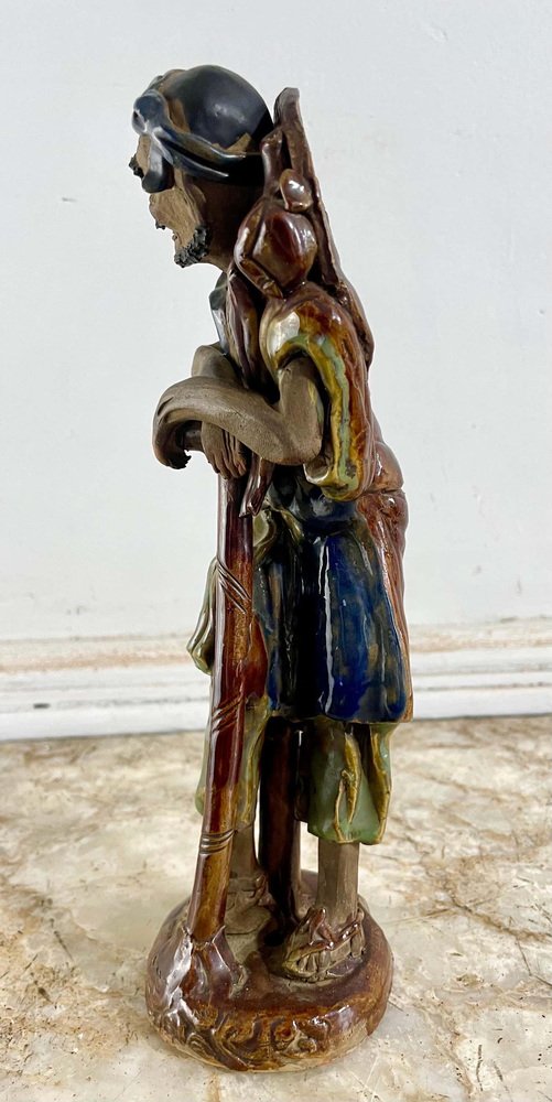 Ceramic Immortal Li Tieguai Statuette in Yellow and Blue, China, 19th Century