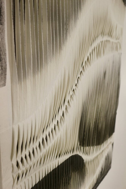 Charcoal and White Textured Board with Pleated Wave Effect