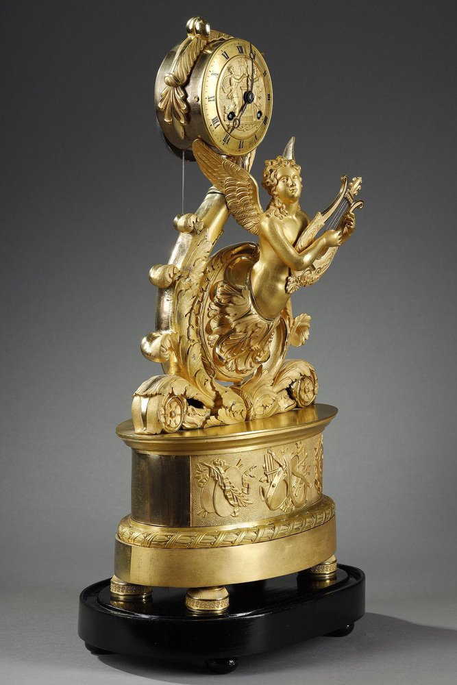 Charles X Gilt Bronze Clock with Winged Genie