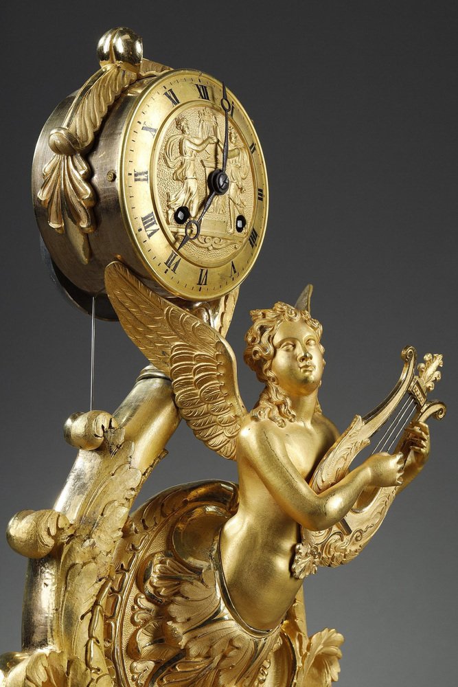 Charles X Gilt Bronze Clock with Winged Genie