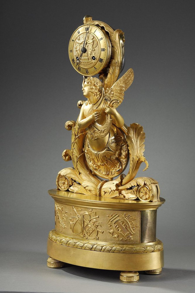 Charles X Gilt Bronze Clock with Winged Genie