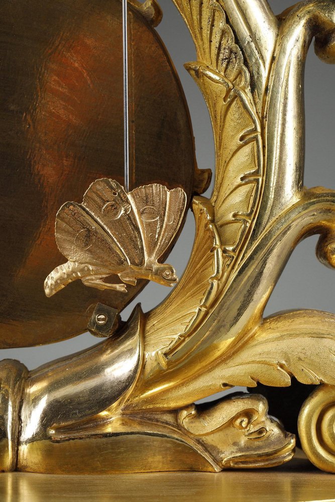 Charles X Gilt Bronze Clock with Winged Genie