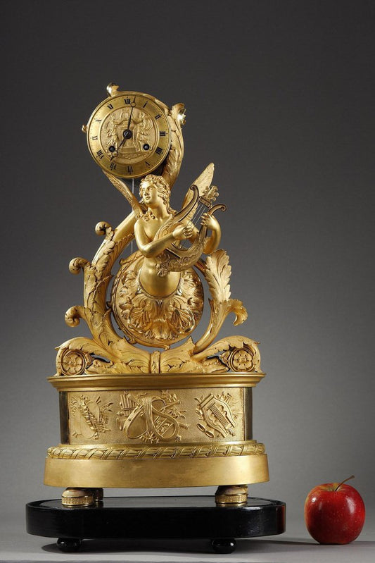 Charles X Gilt Bronze Clock with Winged Genie