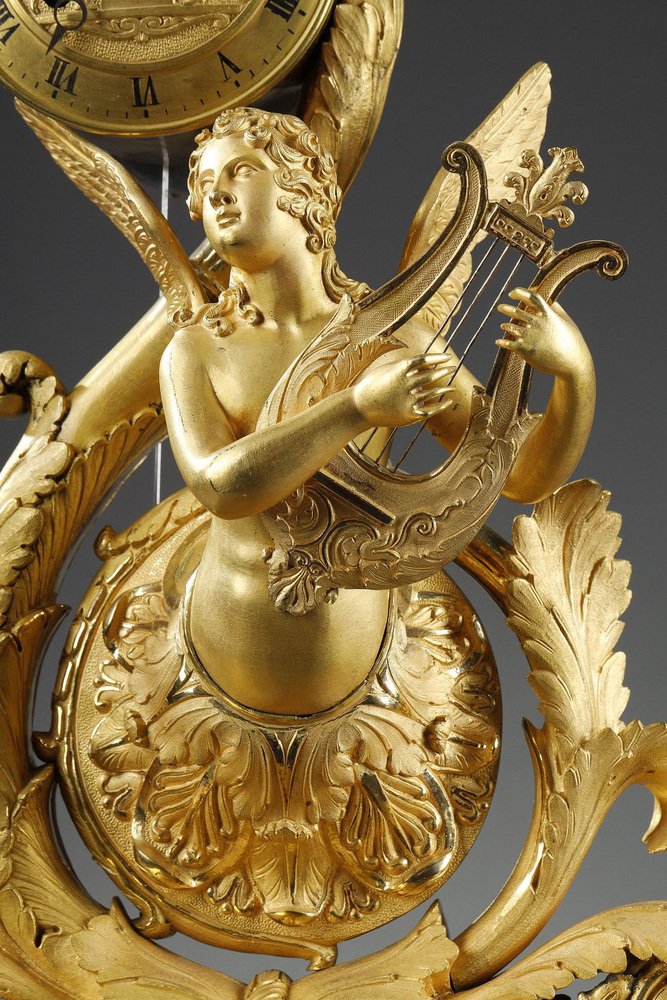 Charles X Gilt Bronze Clock with Winged Genie