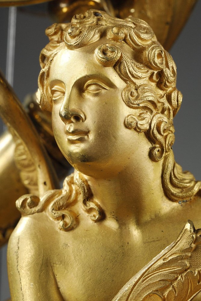 Charles X Gilt Bronze Clock with Winged Genie