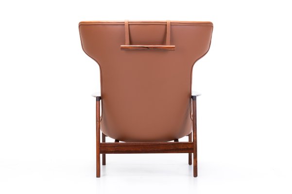 Cognac Leather & Rosewood Wingback Lounge Chair by Ib Kofod Larsen for Fröscher, 1970s-RNH-782790