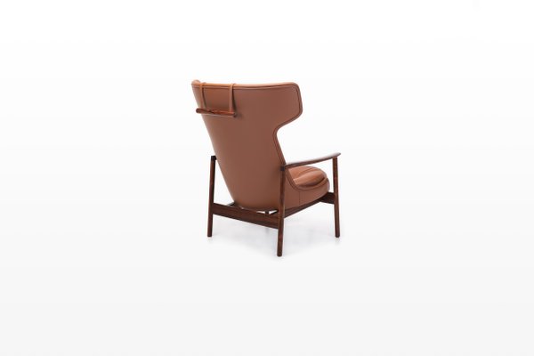 Cognac Leather & Rosewood Wingback Lounge Chair by Ib Kofod Larsen for Fröscher, 1970s-RNH-782790