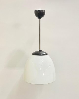 Czech Sunburst White Milk Glass and Bakelite Pendant Lamp from Napako, 1930s-ZCY-1375893