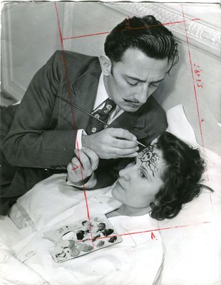 Dali is Painting Medusa's Head on Galas Forehead, 1955-DYV-701005