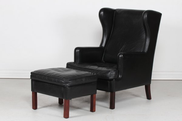 Danish Modern Wing Chair and Stool with Black Leather in Kaare Klint Style, 1970s, Set of 2-QQ-1383419