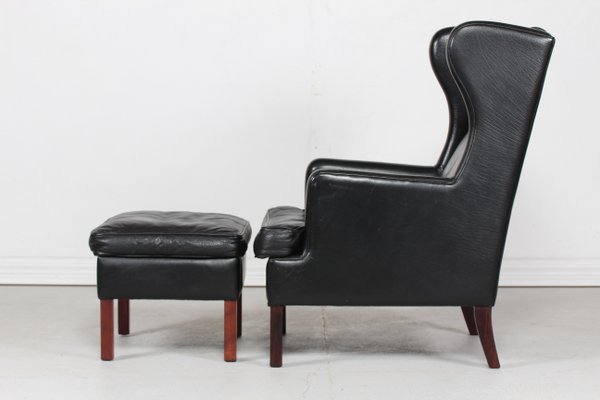 Danish Modern Wing Chair and Stool with Black Leather in Kaare Klint Style, 1970s, Set of 2-QQ-1383419