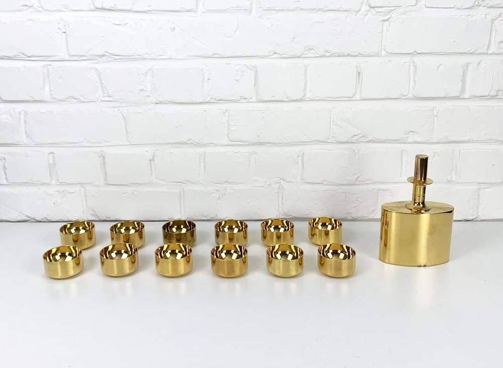 Decanter and Tumblers in Gold Plated Brass by Pierre Forsell for Skultuna, 1960s, Set of 13