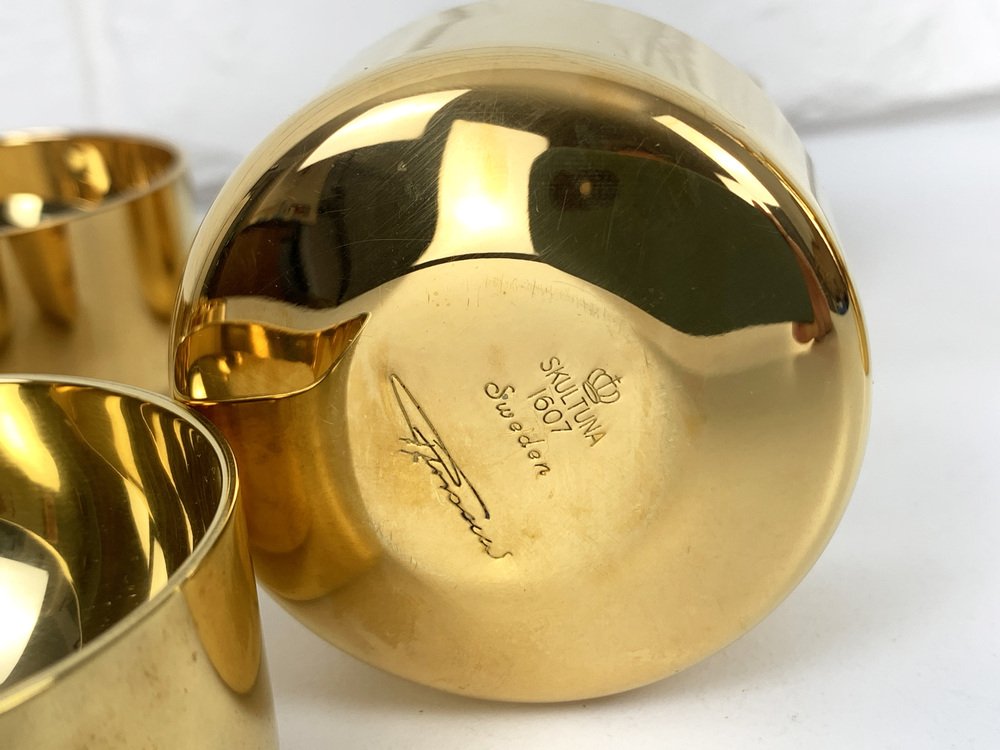 Decanter and Tumblers in Gold Plated Brass by Pierre Forsell for Skultuna, 1960s, Set of 13