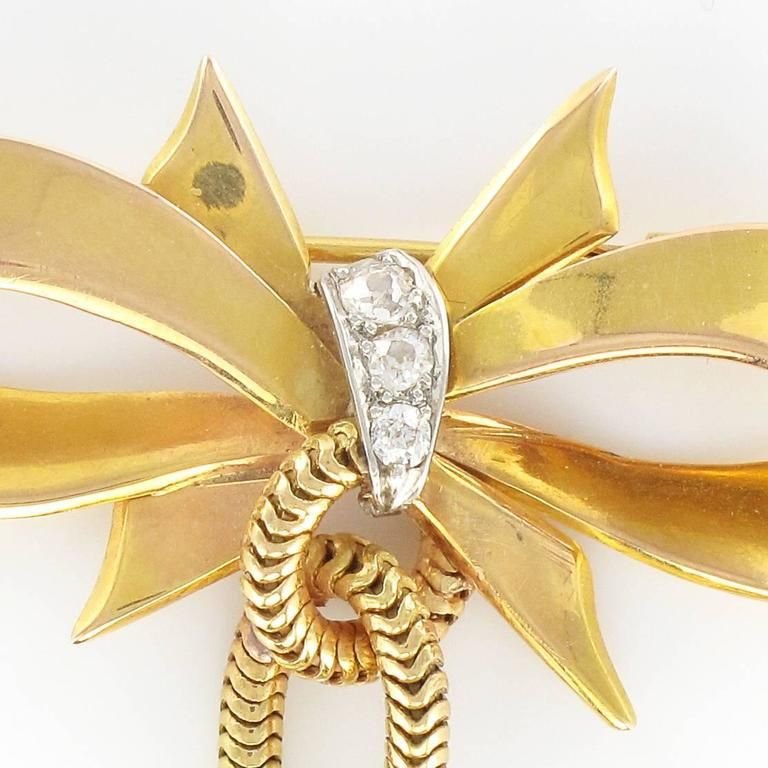 Diamond Gold Tank Tubogaz and Bow Brooch, 1950s