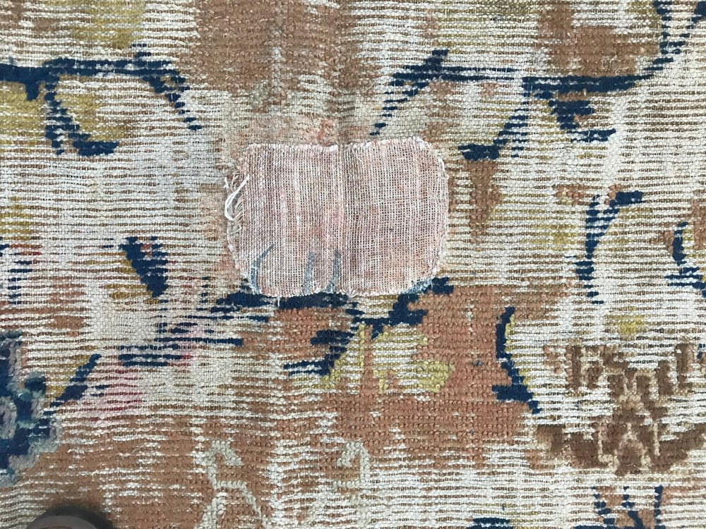 Distressed Chinese Rug