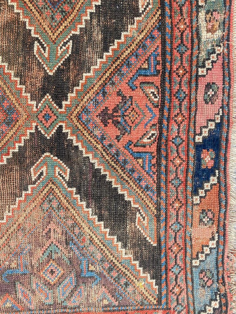 Distressed Kurdish Rug