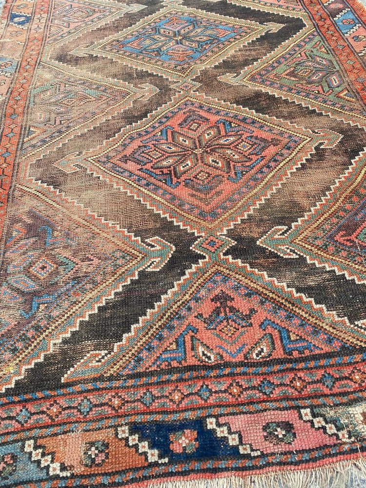 Distressed Kurdish Rug