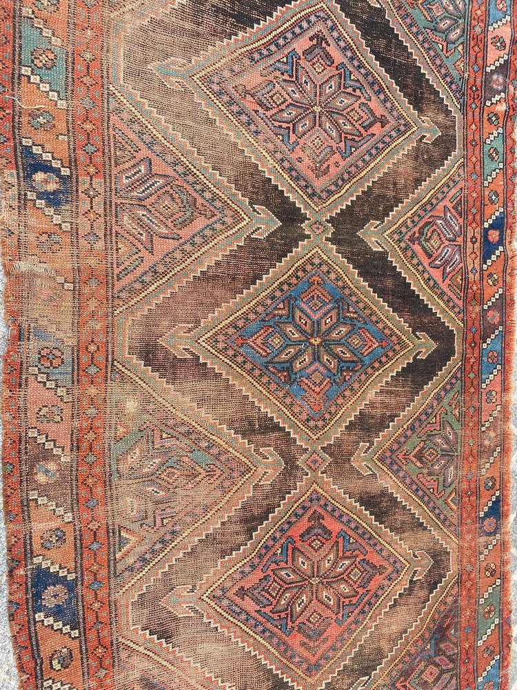 Distressed Kurdish Rug