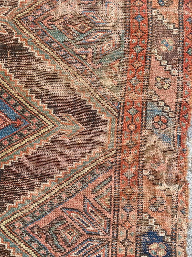 Distressed Kurdish Rug