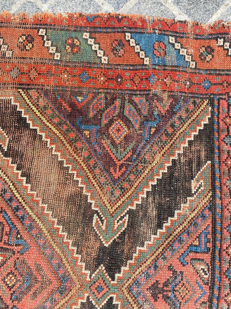 Distressed Kurdish Rug